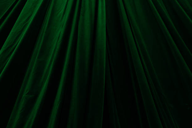 istock Green curtain in theatre background 2188898448