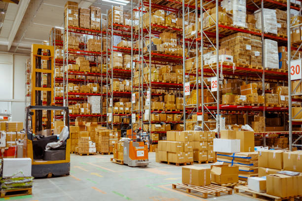 istock Spacious Modern Warehouse with High Ceilings and Neatly Organized Shelves 2188900577