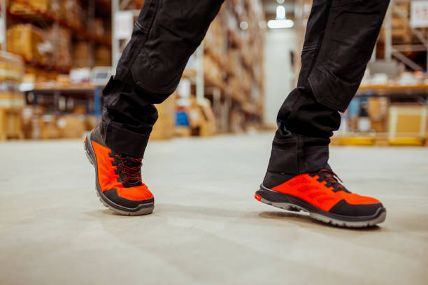 istock Warehouse Employee in Durable Protective Shoes 2188900669