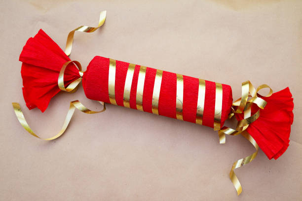 istock A beautifully designed candy with red and gold stripes and ribbons 2188902696