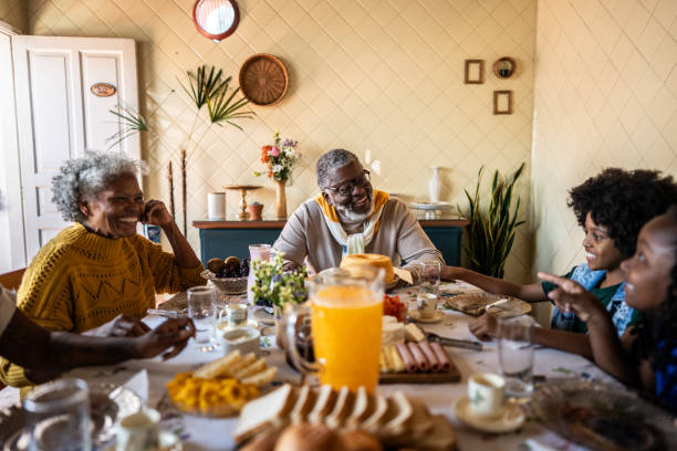 istock Family talking while having breakfast at home 2188903870