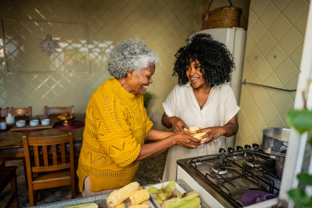 istock Mother and daughter cooking at home 2188904564