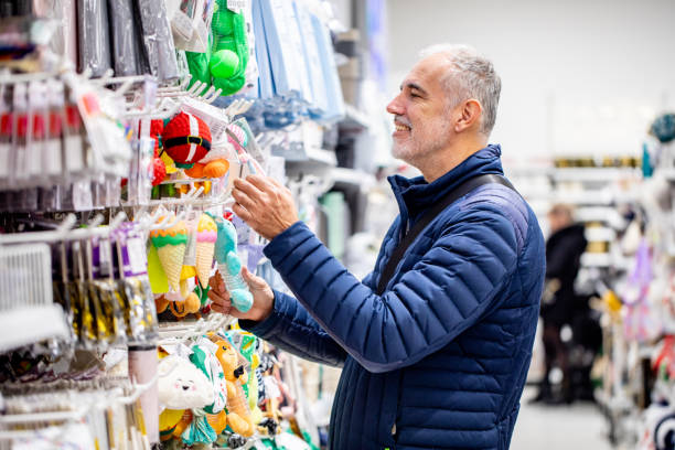 istock Mature man shopping for Christmas decorations 2188905306