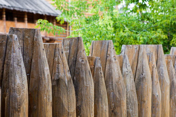 istock Fence made of sharp wooden stakes 2188908420