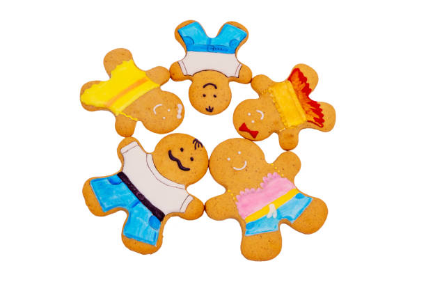 Family of gingerbread men on a white background. Ginger cookies. Symbol Family day, food concept.