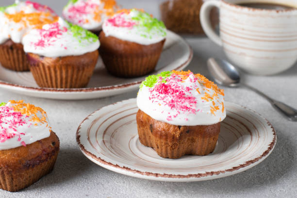 istock Cupcakes with protein cream sprinkled with colorful coconut flakes 2188909440