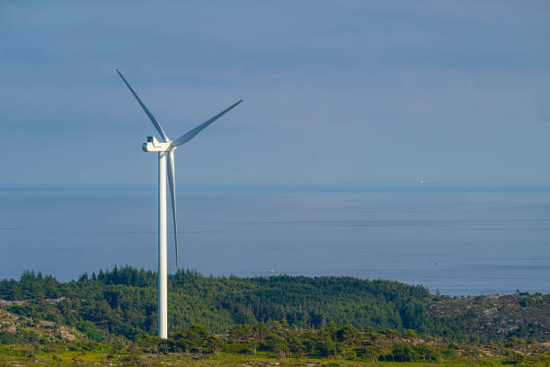 istock Wind power turbine in a hilly landscape.. 2188915235