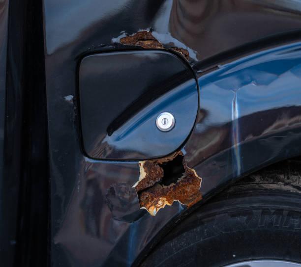 istock Tank filler cap og a crash damaged car.. 2188916429