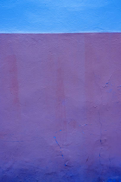 istock Vibrant abstract textured colorful painted wall divided in half  blue and lilac horizontal color parts, perfect for background, design or artistic project. Copy space 2188916592