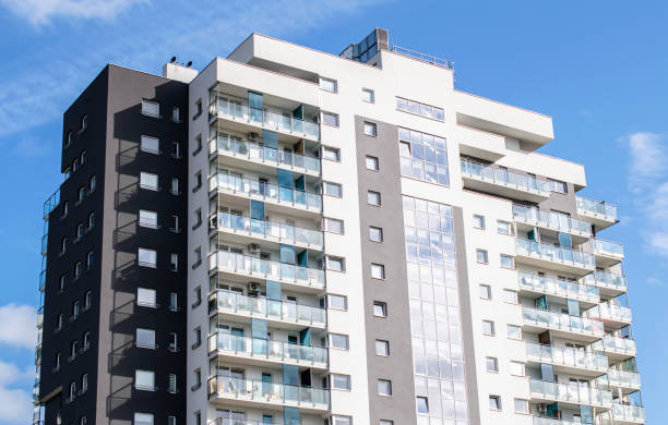 istock apartment blocks on a sunny day 2188919742