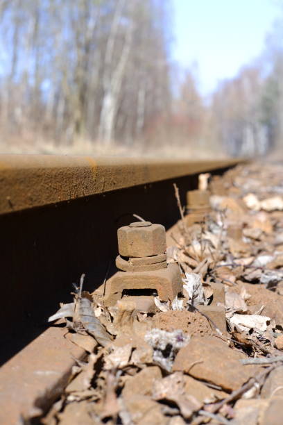 Metal rusty train track in a industrial area