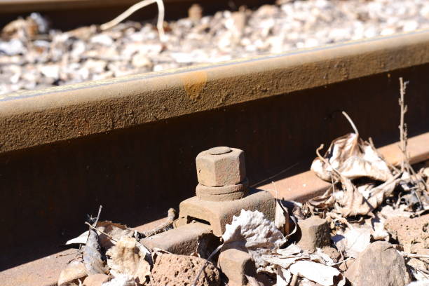 Metal rusty train track in a industrial area