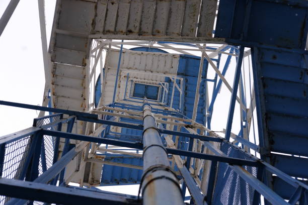 Stairs in a blue and white metal structure
