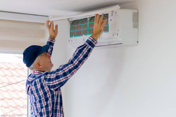 istock A technician  removing air filter of the air conditioner for cleaning 2188922366