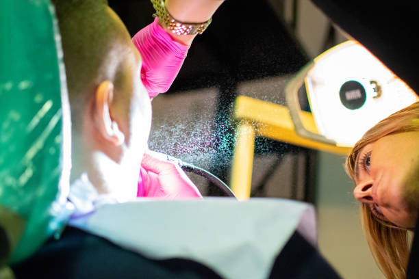 istock a dentist fixes the teeth of an unrecognizable patient in a dental office 2188927056