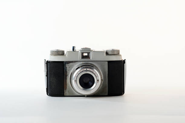 istock Vintage camera displayed on a neutral background for artistic photography 2188927514