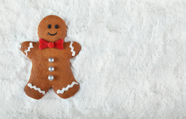 istock Christmas Gingerbread men on the snow 2188933061