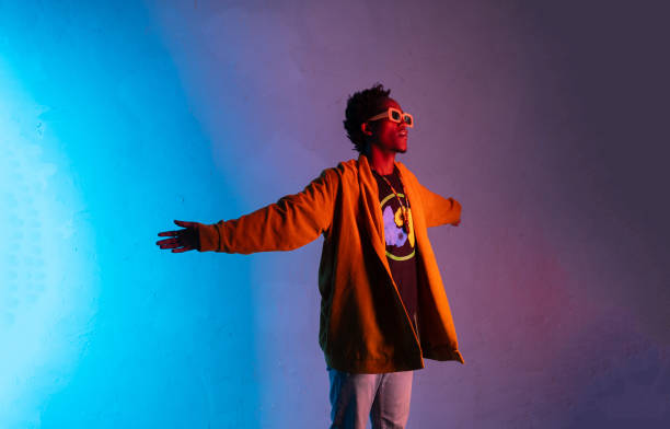 istock An African man standing with his arms outstretched 2188934657