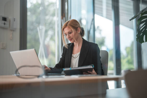 istock Businesswoman in Modern Corporate Setting 2188935049