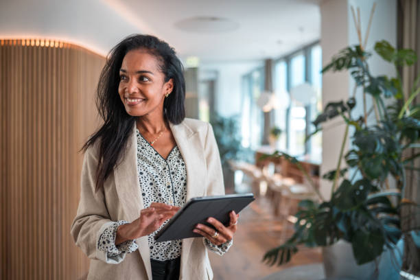 istock Good Looking Professional Woman with Digital Technology 2188935076