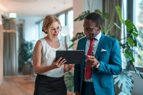 istock Business Couple Office Collaboration With Digital Tools 2188935095