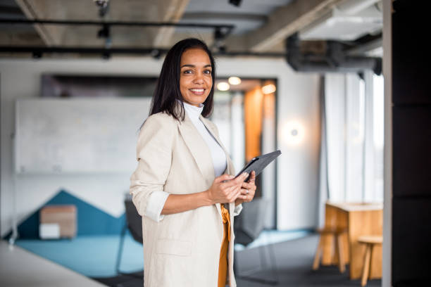 istock Confident Hispanic Businesswoman in Modern Office Space 2188935144