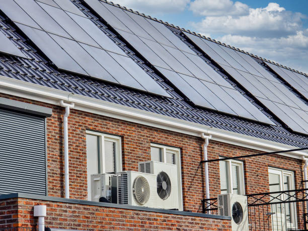 istock air source heat pump unit installed outdoors at a modern home with solar panels in the Netherlands 2188935330