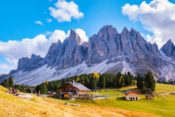 istock Majestic Dolomites landscape featuring rustic cabins and towering peaks in autumn sunlight 2188935838
