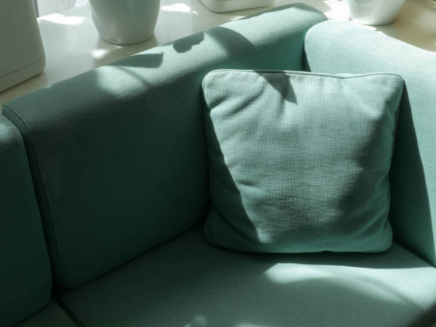 istock Stylish home interior with green velvet design sofa. 2188941972
