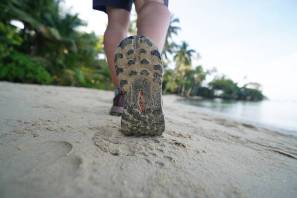 istock foot steps on sandy beach in tropical nature 2188948715