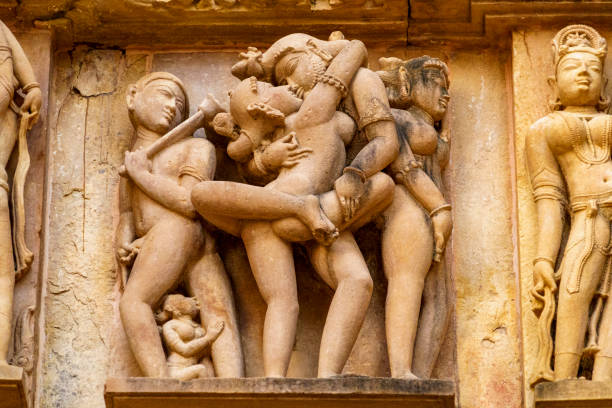 istock India. Khajuraho. Erotic sculpure at Lakshmana temple 2188953415