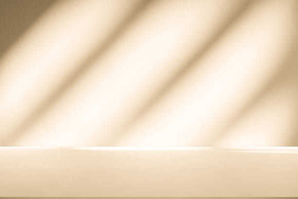 istock Studio style background wall decoration presentation uses white and beige tones. with shadows cast from a nearby window, concept creating a decorative 2188954076
