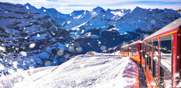istock Alps train descending down from Jungfraujoch peak to Wengenpanoramic snowy view, idyllic alpine landscape 2188959212