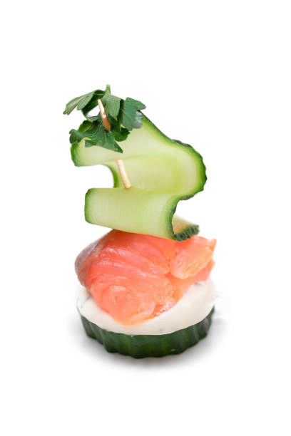 Slices of smoked salmon with capers, onions, and cream cheese