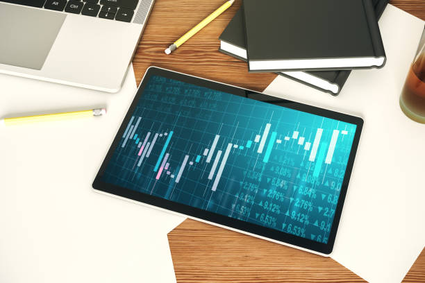 istock Digital tablet with abstract financial graph, finance and trading concept. Top view. 3D Rendering 2188972195