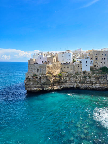 istock Explore the breathtaking coastal cliffs of Puglia, Italy, under a bright blue sky 2188976986