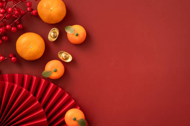 istock Chinese lunar new year background with fresh tangerine and red envelope. 2188977458