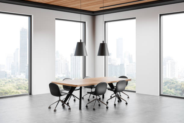 istock White meeting room interior with table and chairs, panoramic window 2188978404