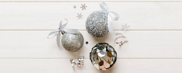 istock Christmas ball on colored background. decoration bauble with ribbon bow with copy space 2188978783