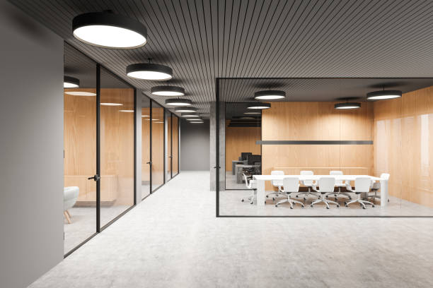 istock Industrial office interior with glass conference space and coworking zone 2188979461
