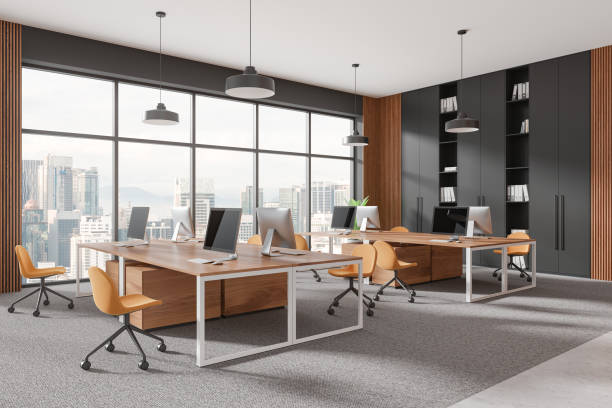 istock Modern office interior with desks, chairs, and computers in a high-rise building. 3D Rendering 2188980287