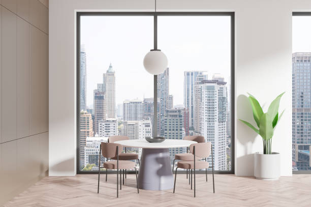 istock Cozy home living room interior with eating table and chairs, panoramic window 2188980347