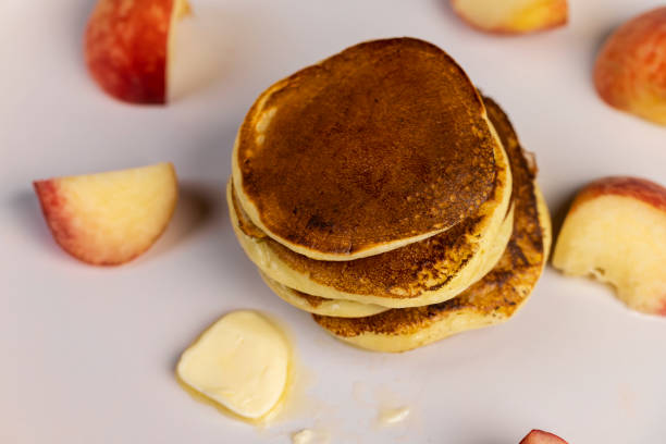 istock milk pancakes with butter and sliced peach slices 2188982221