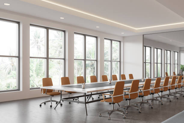 istock Modern office room interior with meeting board and armchairs, panoramic window 2188982911