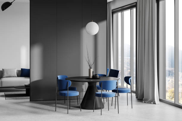 istock Modern dining area with blue chairs, round table and large windows in minimalist design concept. 3D Rendering 2188982978