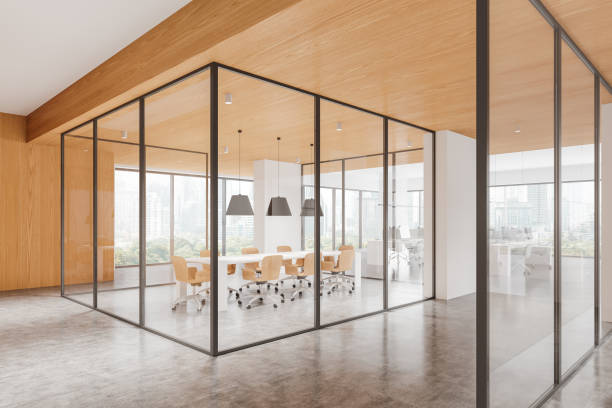 istock Modern office interior with glass partitions and wooden elements. 3D Rendering 2188983301