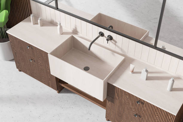 istock Modern bathroom design with a minimalist sink and countertop. 3D Rendering 2188983390