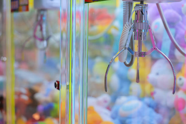 istock A Colorful Claw Machine Filled with Soft Plush Toys and Fun Offers. 2188985621