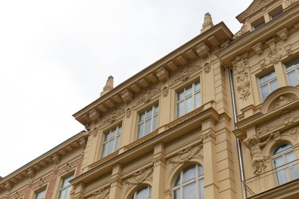 istock A large building with many windows and a white sky behind it 2188985852