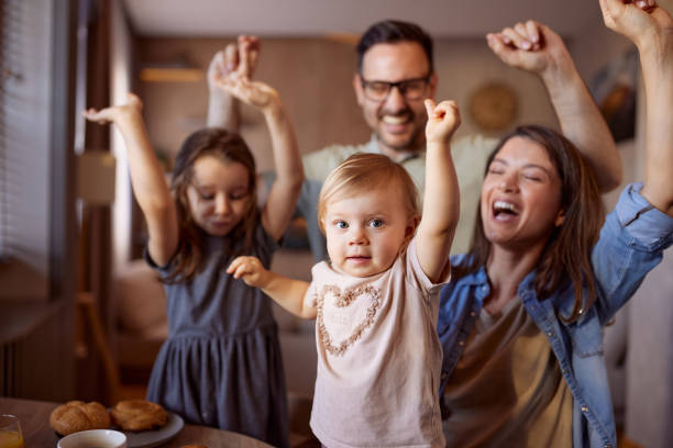 istock Happy family having fun together at home. 2188986394